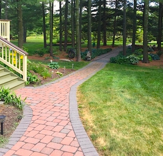 Design & construction of walkway, plantlife, bushes, and mulch beds